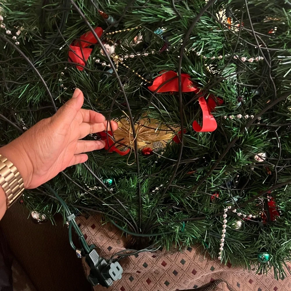 Festive Holiday Wreath with Gold Bow and Multicolor Ornaments